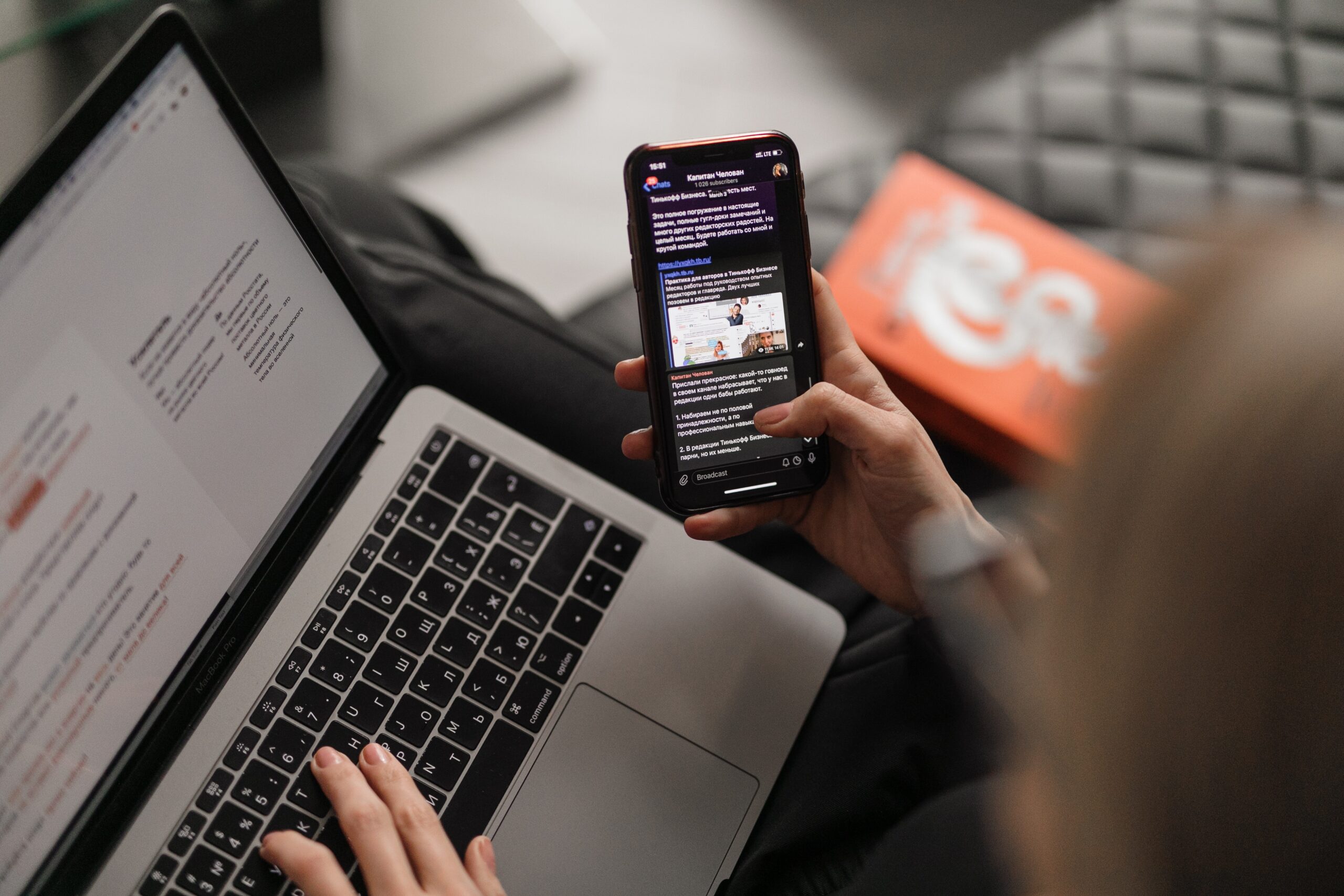 Person checking email and phone messages
